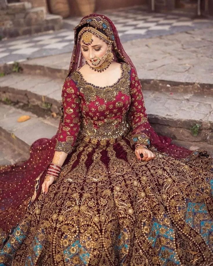 Royal Elegance With This Breathtaking Deep Maroon and Antique Gold Bridal Lehenga