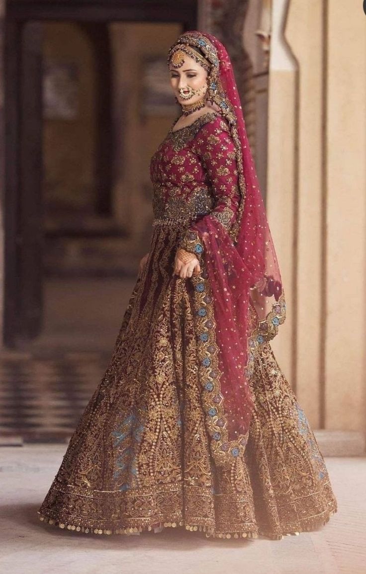Royal Elegance With This Breathtaking Deep Maroon and Antique Gold Bridal Lehenga