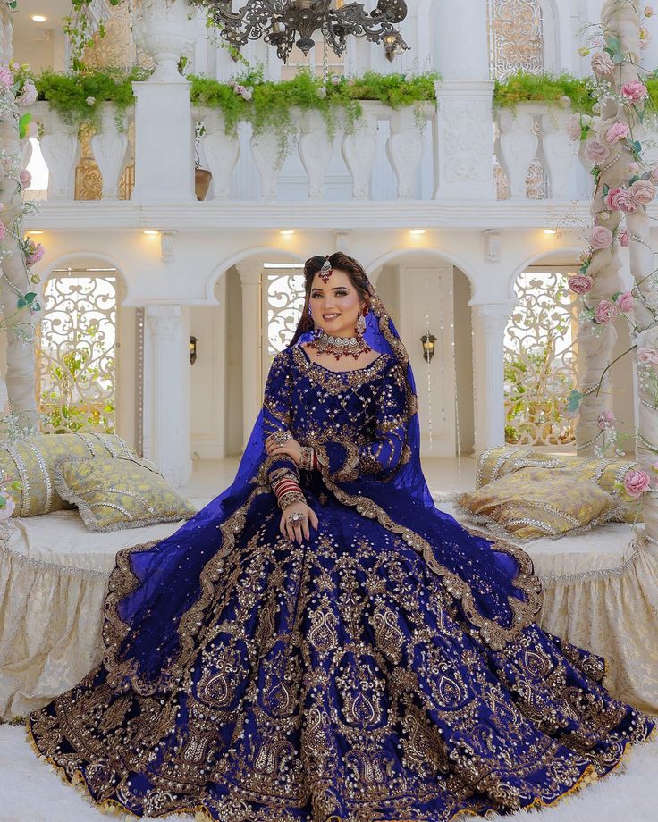 Radiate royal elegance in this stunning royal blue bridal lehenga,